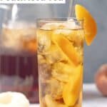 Copycat Olive Garden peach iced tea served with fresh peaches.