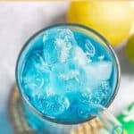 Copycat Sonic ocean water drink and a lemon next to it.