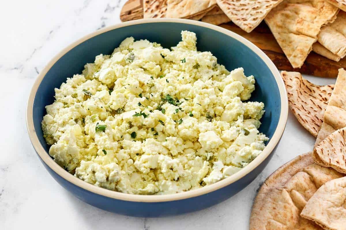 Spicy feta cheese dip and pita bread.