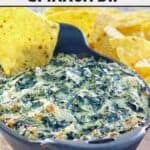 Copycat Cheddar's Santa Fe spinach dip in a cast-iron dish.