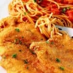 Copycat Cheesecake Factory Chicken Romano, pasta, and tomato sauce.