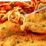 Copycat Cheesecake Factory Chicken Romano served with pasta.