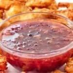 Copycat Joe's Crab Shack dipping sauce in a small glass bowl.