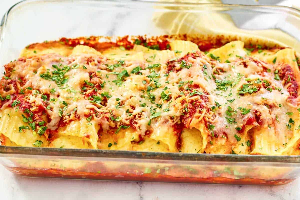 Manicotti stuffed with cheese and baked in marinara.