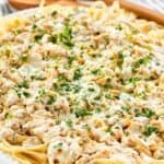 Copycat Old Spaghetti Factory white clam sauce served over linguine pasta on a platter.