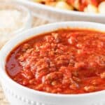 A bowl of copycat Olive Garden three meat sauce.