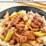 Copycat Panda Express black pepper chicken on top of rice in a bowl.