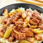 Copycat Panda Express black pepper chicken served over rice.