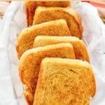 Slices of copycat Raising Cane's Texas toast in a serving basket.