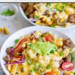Copycat Taco Bell nacho fries bellgrande in two bowls.