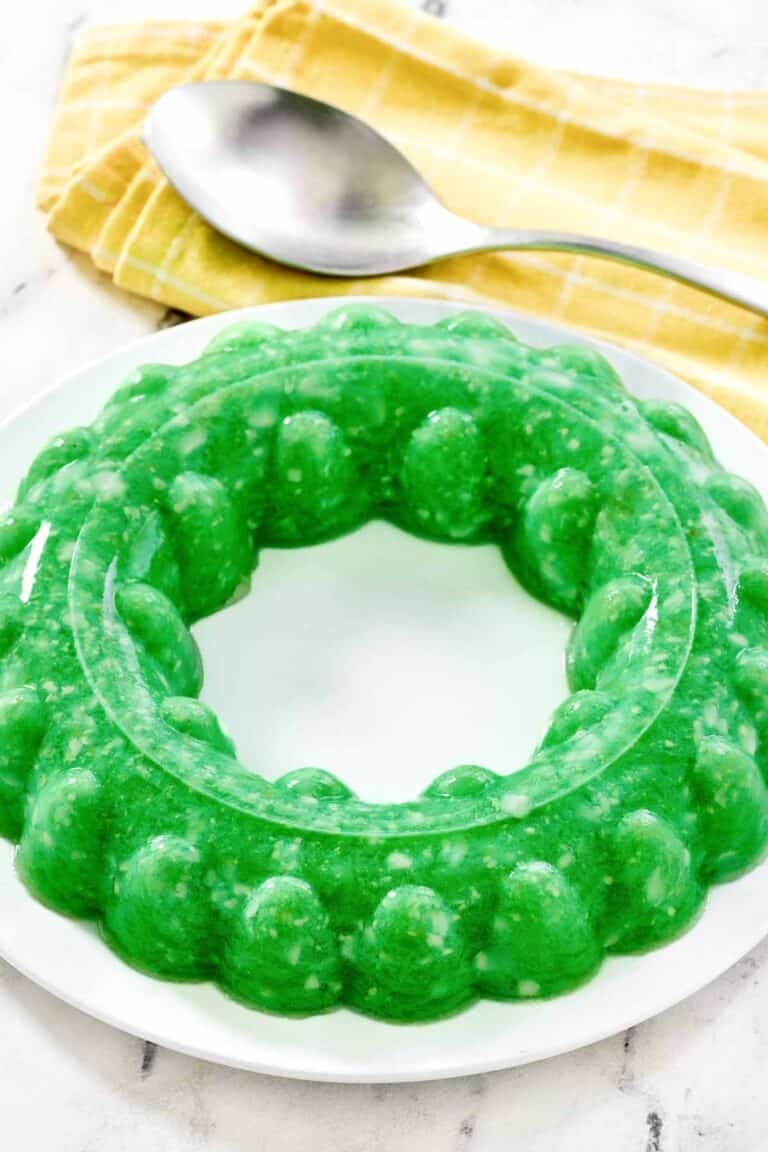 A lime and cottage cheese gelatin salad with pineapple.