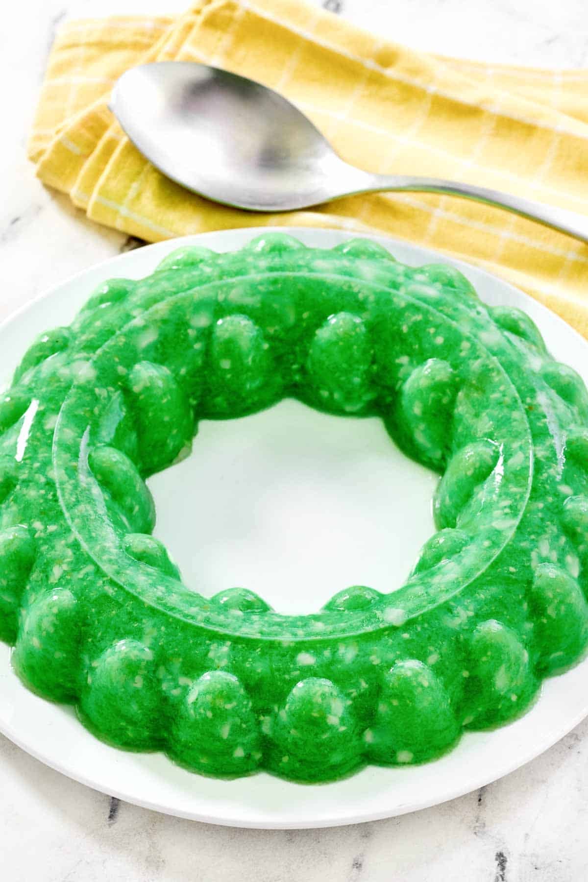 A lime and cottage cheese gelatin salad with pineapple.