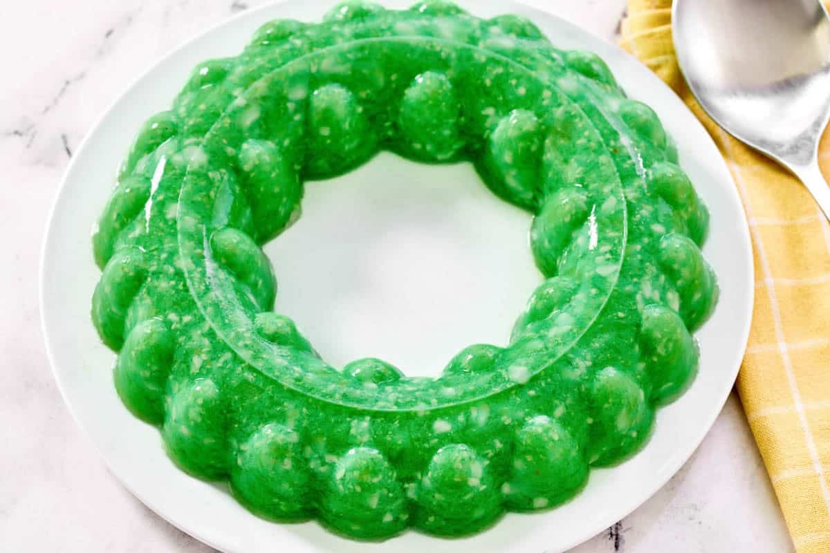 A pineapple, cottage cheese, and lime gelatin salad.
