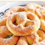 Copycat Auntie Anne's soft pretzels piled on a wire rack.