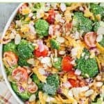 Loaded broccoli salad with bacon, cheese, onion, almonds, and homemade dressing.