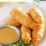 Copycat Chili's chicken crispers and honey mustard sauce on a plate.