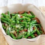 Copycat Cracker Barrel green beans cooked with bacon and onions.