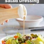 Copycat Houston's buttermilk garlic salad dressing drizzling onto a salad.