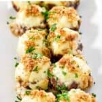 Copycat Longhorn Steakhouse stuffed mushrooms on a platter.