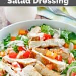 A salad served with copycat Old Spaghetti Factory creamy pesto dressing.