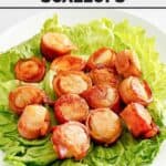 Copycat Red Lobster bacon-wrapped scallops over lettuce leaves on a platter.