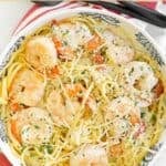 Copycat Red Lobster shrimp pasta garnished with parmesan cheese.