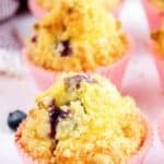 Copycat Starbucks blueberry streusel muffins on a marble surface.
