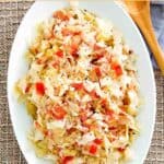 Copycat Luby's skillet cabbage on a platter.