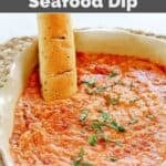 Copycat Olive Garden San Remo seafood dip with a breadstick in it.