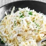 A bowl of copycat Red Lobster Crab Alfredo with linguine.