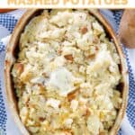 Copycat Saltgrass Steakhouse roasted garlic mashed potatoes topped with a pat of butter.