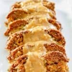 Cheesy hashbrown stuffed meatloaf with brown onion gravy on top.