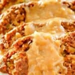 Cheese and hashbrown stuffed meatloaf topped with onion gravy.