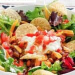 Copycat Wendy's taco salad with tortilla chips.